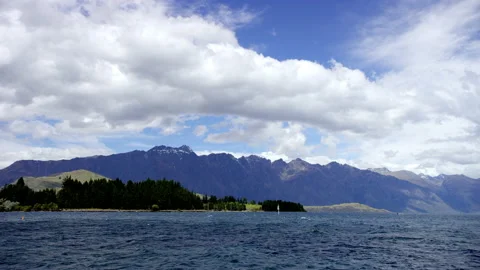 Alpine lake with mountain range Stock Footage 159752333