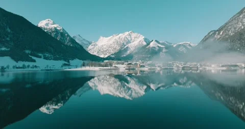 Alpine Lake Reflection With Mist Stock Footage 295210576