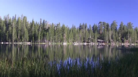 Alpine lake summer cabins Stock Footage 25592626