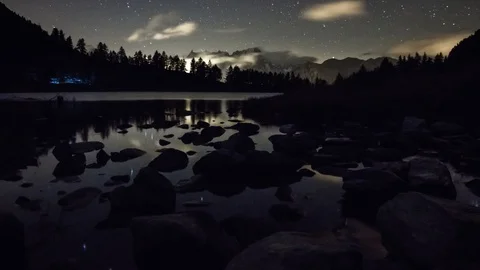 Alpine lake timelapse under night sky, Arpy, La Thuile, Alps, Italy, Europe Stock Footage 93152163