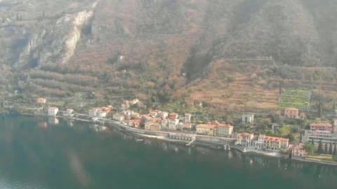 Alpine Lake Village Aerial View with Mountain Landscape Stock Footage 341607341