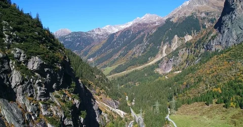 Alpine landscape, Cinema 4k decreasing view of snowy mountains and colorful f Video stock 84001084