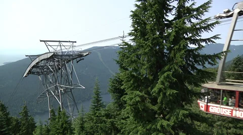 Alpine lift going down at Grouse Mountain, Vancouver B.C. Video stock 32663032