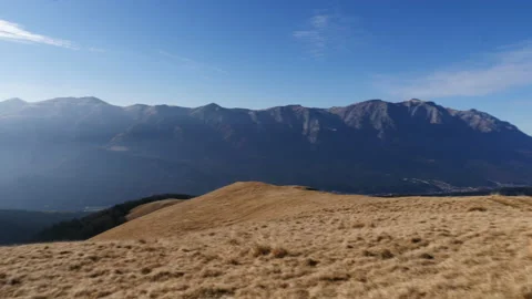 Alpine meadow overview with mountains in the background Stock-Footage 168666176