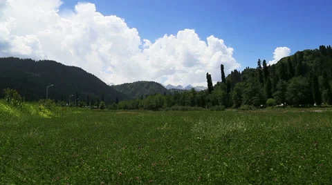 Alpine meadow under blue sky, Ili River Valley Stock Footage 54937596