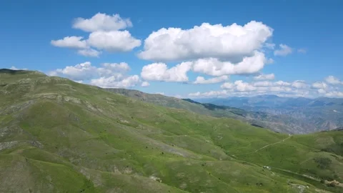 Alpine Meadows and Cloudy Blue Sky Stock Footage 332490632