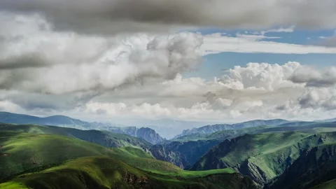 Alpine meadows. Play of light and shadows. Beautiful movement of clouds. 動画素材 162208797