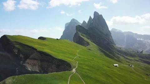 Alpine mountain peak seceda Dolomites with hiker in summer Stock Footage 168578753
