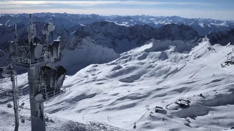 Alpine mountain ridge with panoramic busy ski resort Stock Footage 331256885