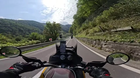 Alpine Mountain Road Motorcycle Ride, Fast Riding Moto Tour Through the Alps Video stock 333201063