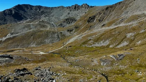 Alpine Mountain Road Through Rocky Terrain Stock Footage 341606361