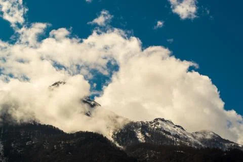 Alpine Mountains and Clouds Stock Photos