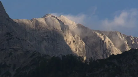 Alpine mountains with clouds on peak Stock Footage 59318086