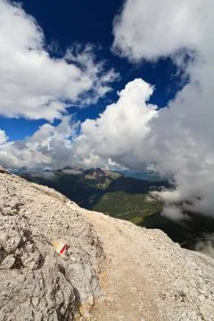 Alpine pathway over the clouds Stock Photos