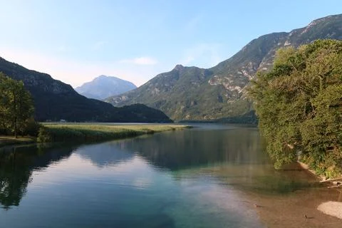 Alpine Peak and Mountain Reflection on Calm Lake in Italy Stock Photos