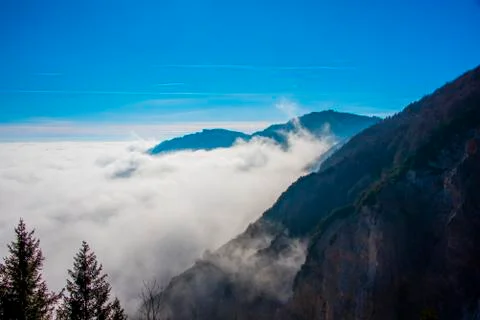 Alpine peaks and clouds Stock Photos