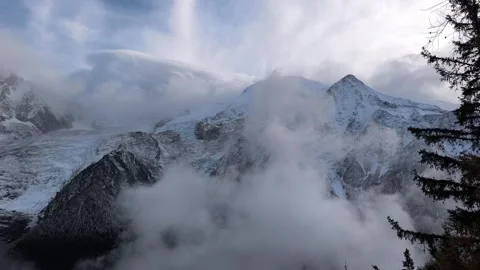 Alpine peaks through cloud cover in Chamonix, France in November Les Houches Stock Footage 292917908