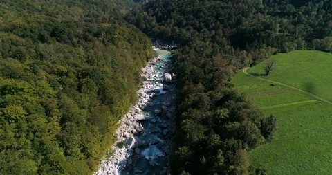 Alpine rapids, C4K aerial drone view over a turquoise, soca river, in the slo Stock Footage 96233688