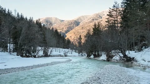 Alpine river flowing downstream in Slovenia. Winter season Stock Footage 148988067