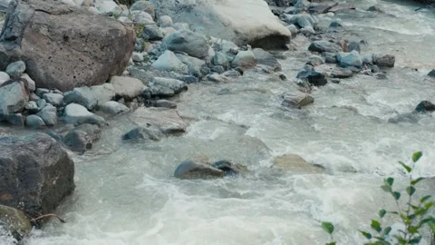 Alpine River Handheld Rushing Water Stock Footage 257711049
