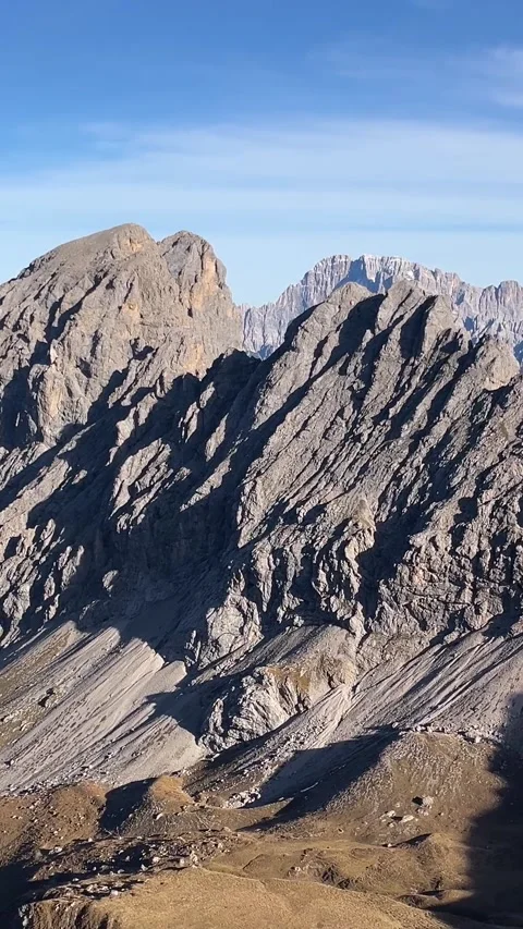 Alpine Rock Formations from High Mountain Pass in the Dolomites – Vertical 4K Stock Footage 331081084