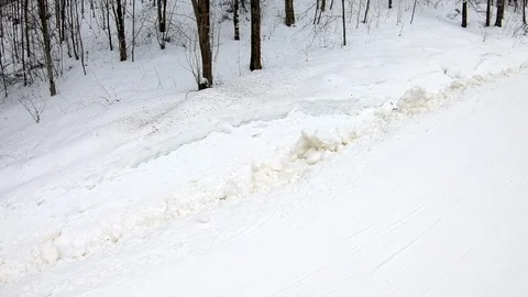 Alpine skier rises on the elevator on mountain Stock Footage 87711531