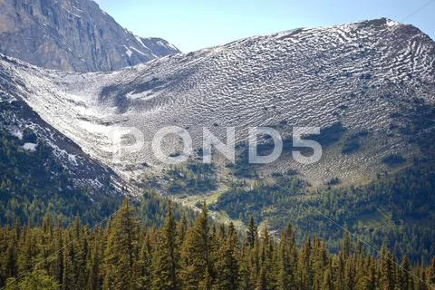 Alpine slopes in the rocky mountains Stock Photos