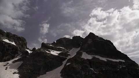 Alpine Snowy Peak Clouds Timelapse 2 4K Stock Footage 64771629