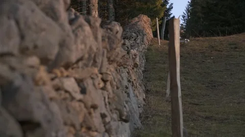 Alpine stone wall in mountain pasture Video stock 327620557
