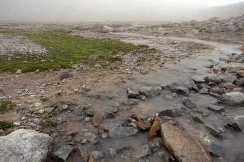 Alpine stream from the glacier. Foto stock