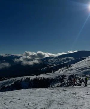 Alpine Summit - Pristine Mountain Ski Slopes Under Brilliant Sun Stock Photos