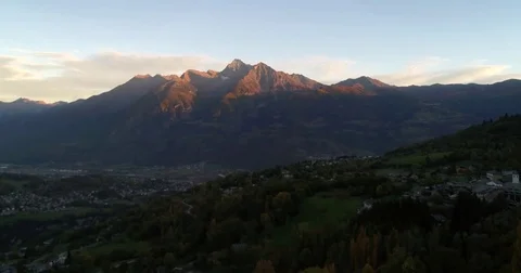 Alpine sunset, Cinema 4k view towards a colorful mountain sunset , on a sunny Stock Footage 83997874