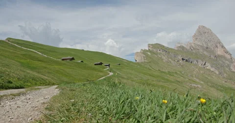 Alpine trail and mountain huts on Seceda in the Dolomites 스톡 동영상 340781071