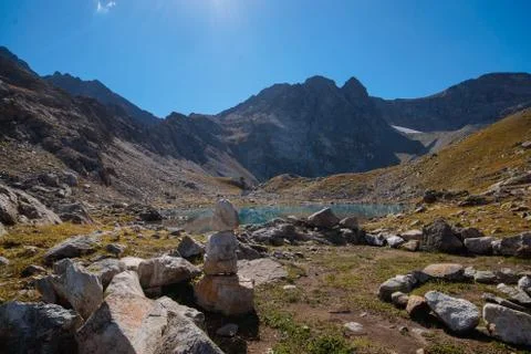 Alpine turquoise lake of Sofia, surrounded by rocks. Karachay-Cherkessia, Ark Stock Photos