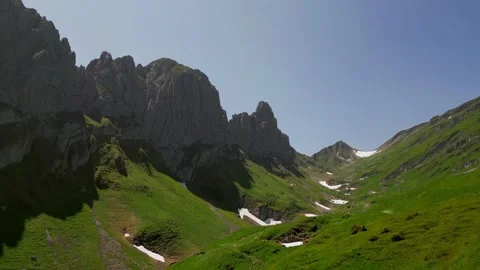 Alpine Valley Panorama Drone Pullback Saxer Lucke Stock Footage 323331247