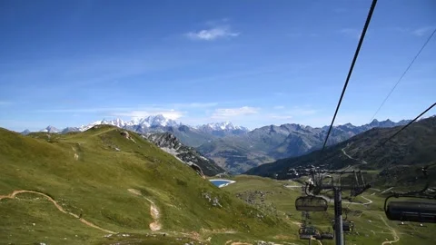Alpine view and cable car in motion near Arcs 2000 ski station in Savoie, France Stock Footage 248451395