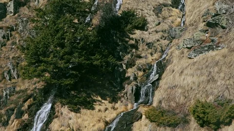 Alpine water stream at spring melting Stock Footage