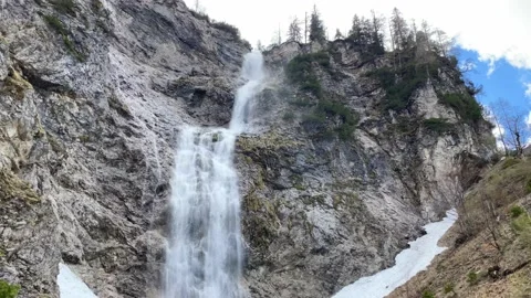 Alpine Waterfall and Snow at Offensee Lake, Austria Stock Footage 220505313