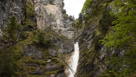 Alpine waterfall Pöllatschlucht in the springtime Stock Footage 134680636