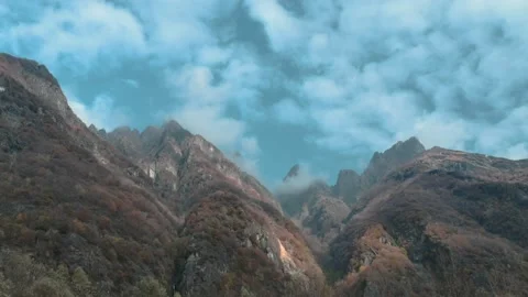 Alpine White Clouds Flow Blue Marine Sky Autumn Time Lapse Stock Footage 217708370