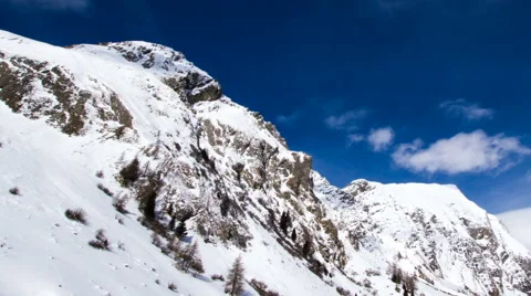 Alpine winter clouds time lapse Stock Footage 64962443
