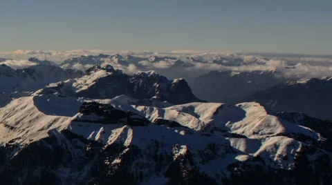 Alpine winter landscape, mountains and horizon covered in clouds Stock Footage 46132277