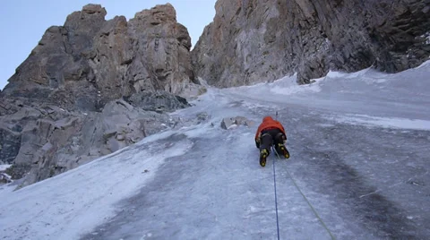 Alpinist at slope climbs to Everest top Stock Footage