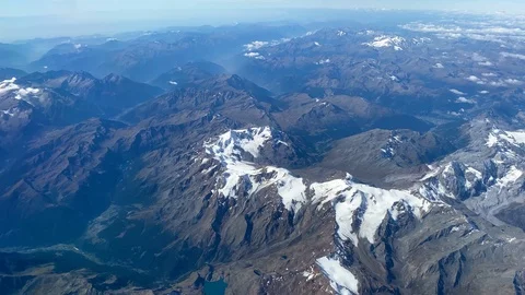 The Alps from above by airplane 動画素材 119437541
