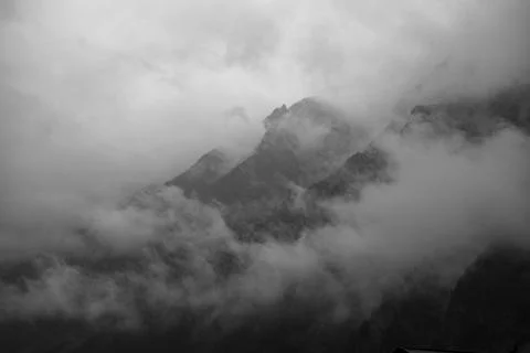 Alps and clouds Stock Photos