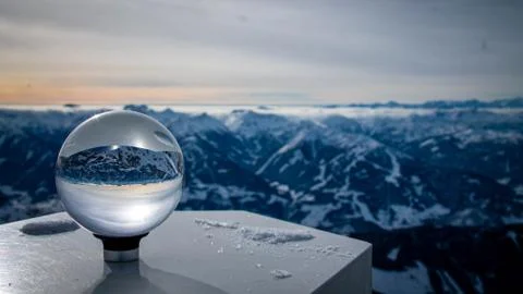 Alps in Austria through shown through a glass sphere Stock Photos
