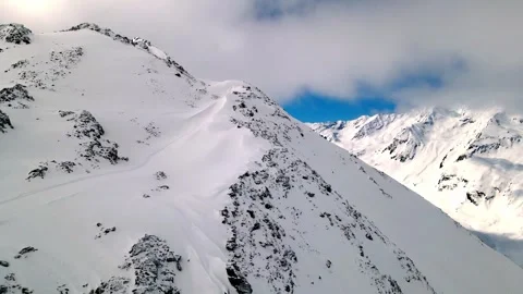 Alps | Bird flight along the mountain to the top Stock Footage 255728249