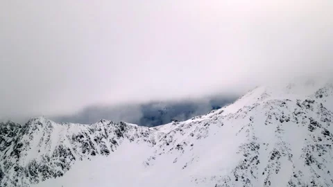 Alps | Bird flight under the clouds Stock Footage 255729156