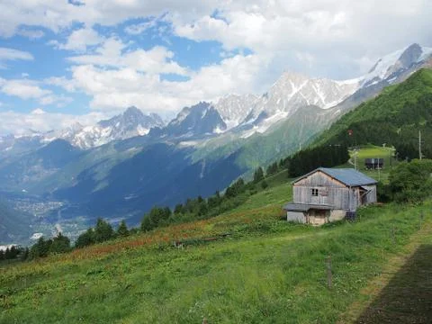 Alps in clouds Stock Photos