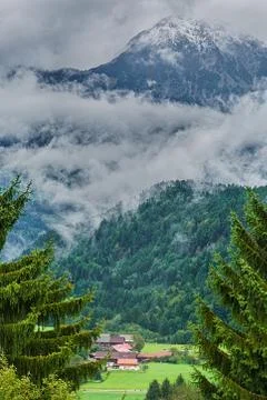 Alps in Clouds Stock Photos